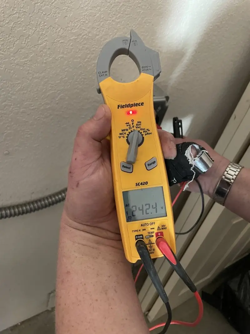 Voltage testing with clamp meter during Circuit Breaker Repair in Liberty